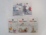 four books of children ' s coloring books on a white surface
