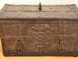 an old wooden box on a wooden table