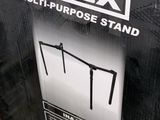 a black box with a sign on it that says innex multi purpose stand
