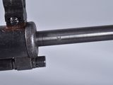 a close up of a machine gun on a table