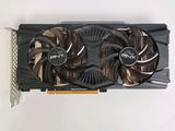 a close up of a video card with a fan on top of it