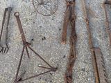 a lot of old rusty tools on the ground