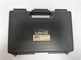 a close up of a black case with a sticker on it
