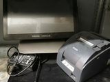 a computer and a printer on a desk