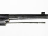 an old gun that is sitting on top of a table