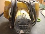 a yellow machine that is sitting on a table