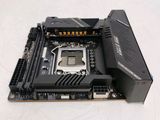 a close up of a motherboard with a hard drive attached to it