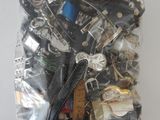 a bag full of assorted items on a white surface