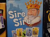 three board games that are sitting on a table