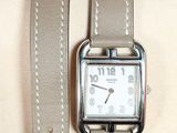 a watch that is sitting in a wooden box