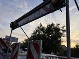 a street sign that is on the side of the road