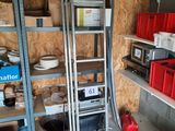 a ladder that is leaning against a wall in a garage