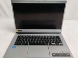a laptop that is sitting on a white surface