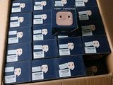 a cardboard box filled with many different types of electronic devices