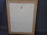 an old picture frame with a hole in the middle of it