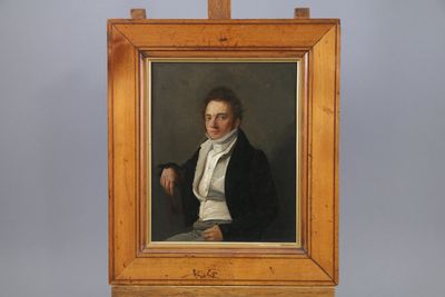 painting of a man in a black coat and white shirt