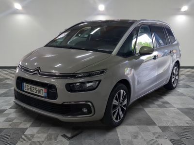 the new citrole is parked in a large room with checkered flooring