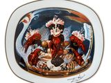 une assiette sur laquelle est représentée une femme dans un bateau