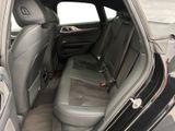 the back seats of a car are empty in a parking lot