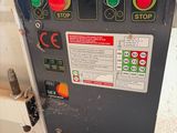 a machine that is sitting on the ground by itself