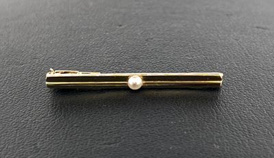 Broche barrette en or jaune 750 millièmes sertie d'une perle…