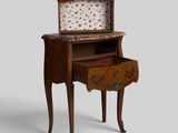 a small wooden desk with a drawer on top of it