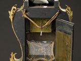 a clock that is sitting on top of a table
