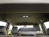 a view of the back of a car from the passenger seat
