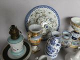 many different types of vases and bowls on the table