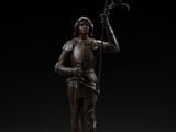 a bronze figure of a knight holding a flag and a sword