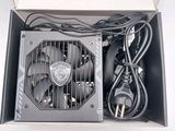 a box with a fan and wires inside of it