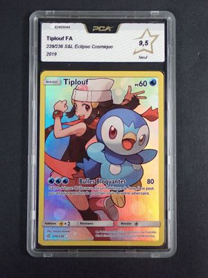 the pokemon trading card is in a plastic holder on a table
