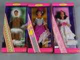 three barbie dolls are in a box with a comb and comb