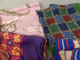 a pile of clothing that is sitting on the floor