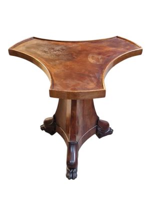 an image of a wooden table with a curved top