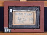 a picture of a wooden frame with a sign on it
