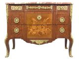 a chest of drawers that has a marble top on it