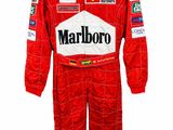 a red racing suit with logos on the chest and sleeves