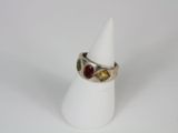 a close up of a ring on a white ring holder