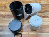 two cups and a cup holder on a wooden table