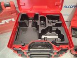 an open tool box with tools in it sitting on a table