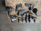 a lot of tools that are sitting on a table