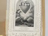 a picture of a book with a picture of a heart on it