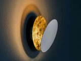 a close up of a light that is on a wall