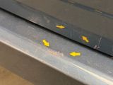 yellow arrows on the side of a car door