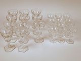 a lot of empty wine glasses sitting on a table