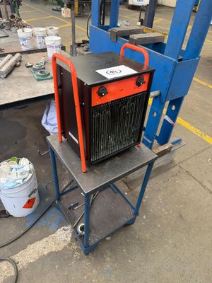 a machine that is sitting on a table in a factory