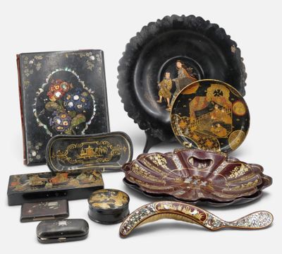 many different types of decorative items displayed on the table
