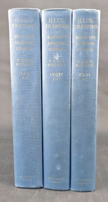 three blue books sitting on top of a table next to each other