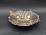 silver plated bowl on black background with silver decoration